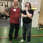 Coaches proudly admiring their old pupils